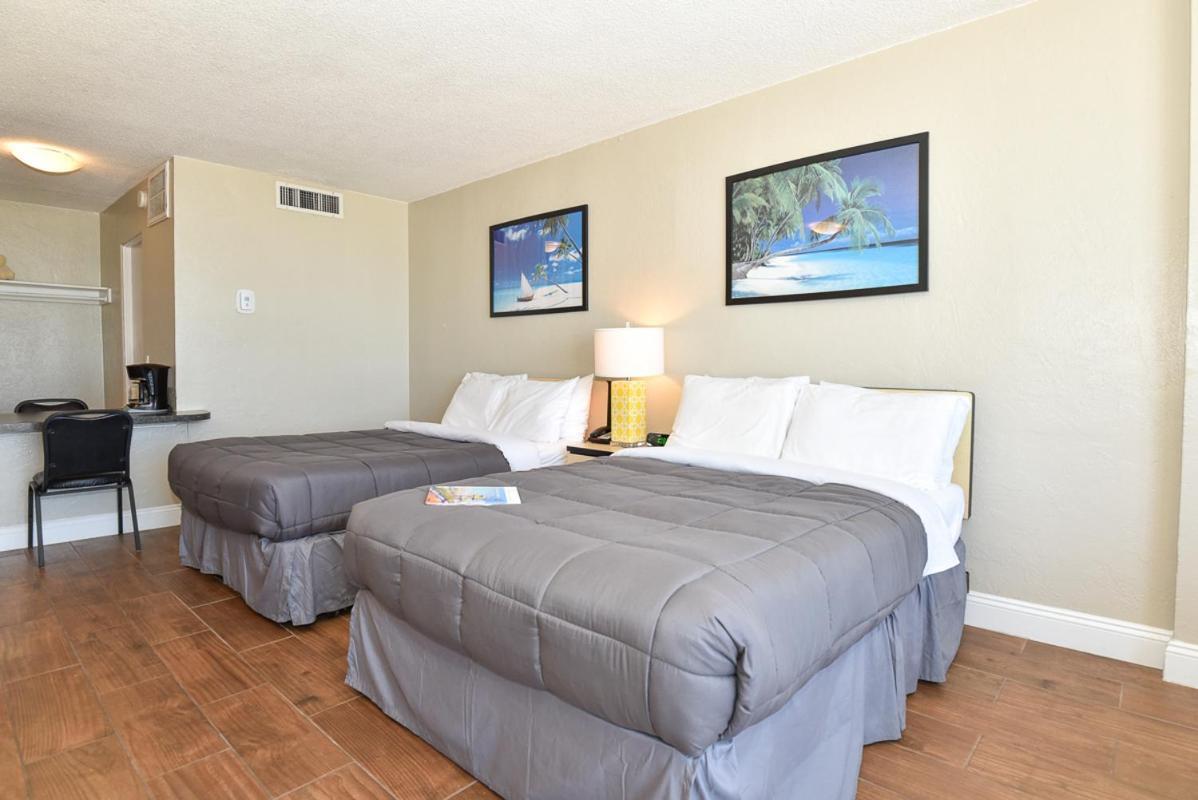 Ocean View Corner Balcony Two Double Beds