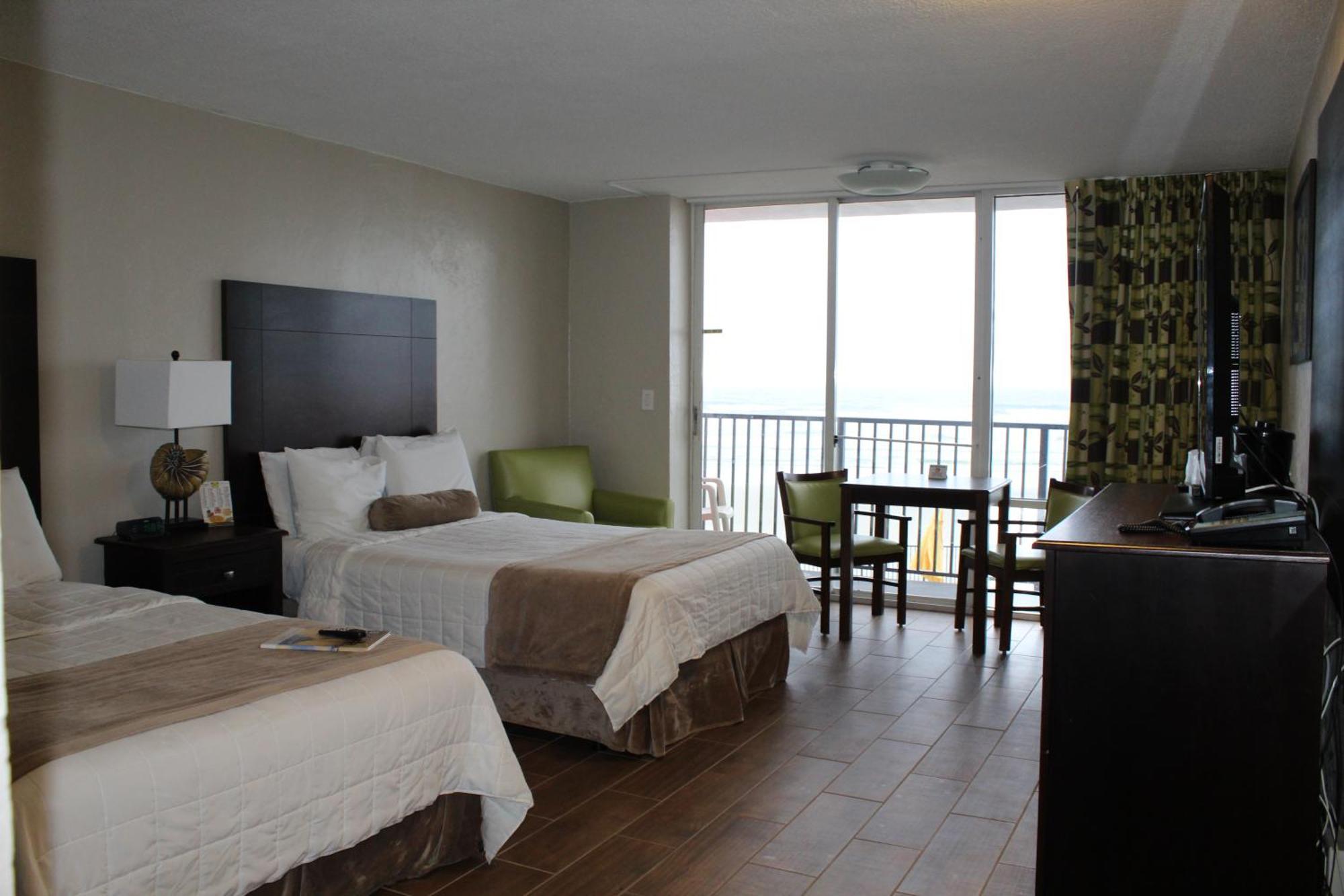 Ocean View Corner Balcony Two Double Beds